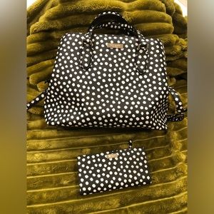 Black & white Kate Spade handbag with matching wallet. Wallet has minor blemish.